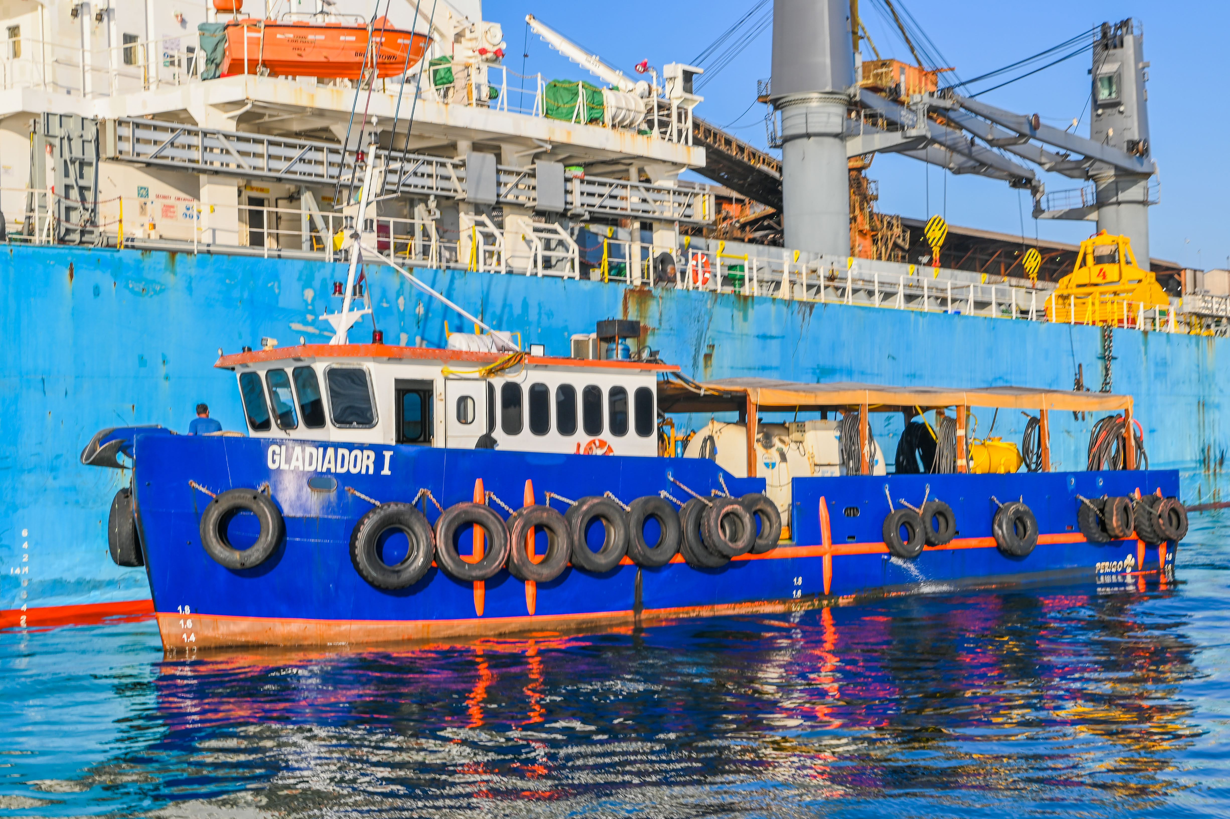 Gladiador I vessel alongside a bulk carrier